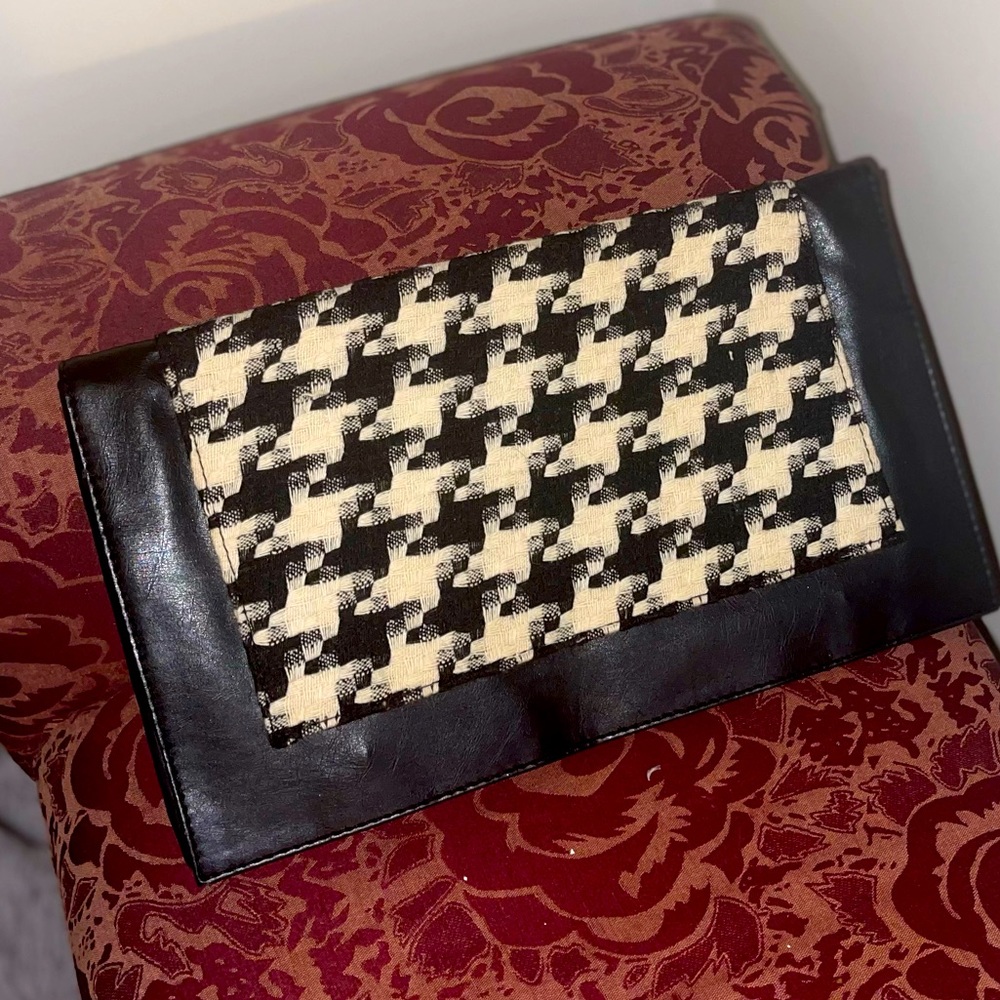 Houndstooth clutch purse. Never used